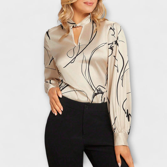 Elegant blouse with line pattern and keyhole detail