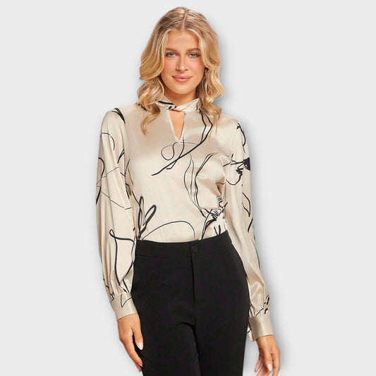 Elegant blouse with line pattern and keyhole detail