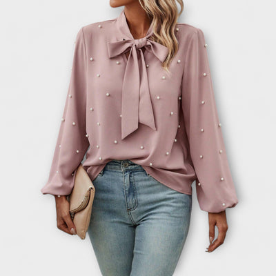 Sophia – Elegant blouse with pearl details and bow