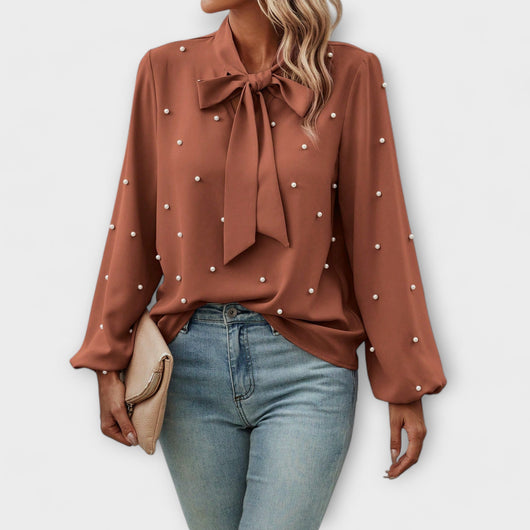 Sophia – Elegant blouse with pearl details and bow
