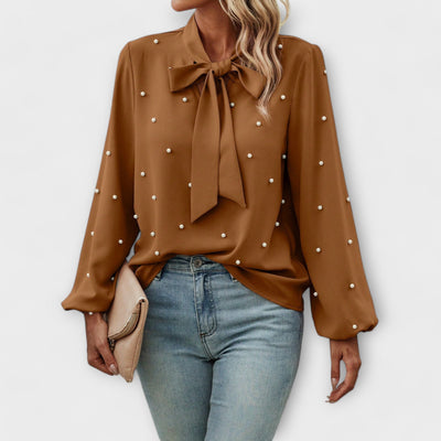 Sophia – Elegant blouse with pearl details and bow