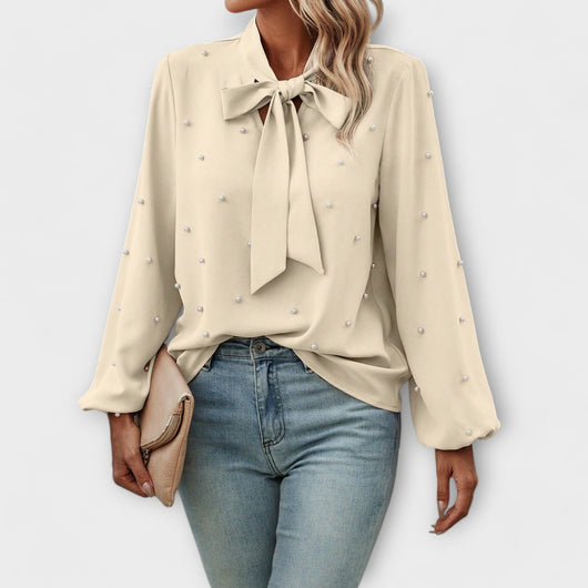 Sophia – Elegant blouse with pearl details and bow