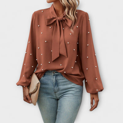 Sophia – Elegant blouse with pearl details and bow