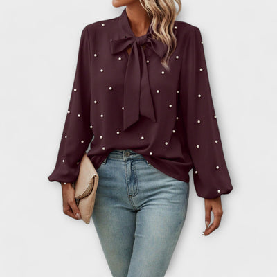Sophia – Elegant blouse with pearl details and bow